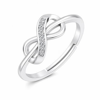A silver-toned infinity-style ring with a row of small clear stones along the upper curve, shown on a clean white background.
