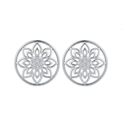 A pair of silver-toned circular stud diamond earrings with an intricate openwork floral mandala design and a small cluster of clear diamond in the center, shown on a plain white background.