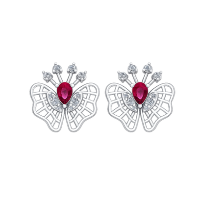 A pair of silver butterfly-shaped stud earrings, each featuring a central teardrop-shaped red Diamond and small clear stones arranged along the upper wing structure, set against a plain white background.